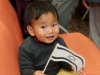 little-boy-with-flag-on-chair