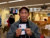older-man-with-id-card